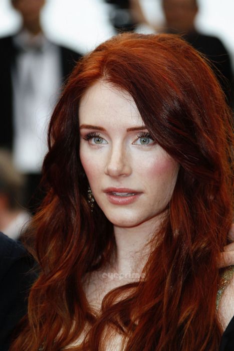 red hair with green eyes